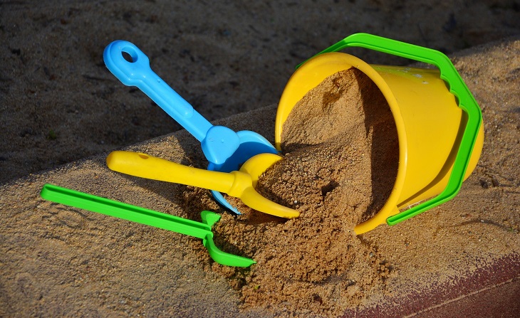 Sandbox with toys